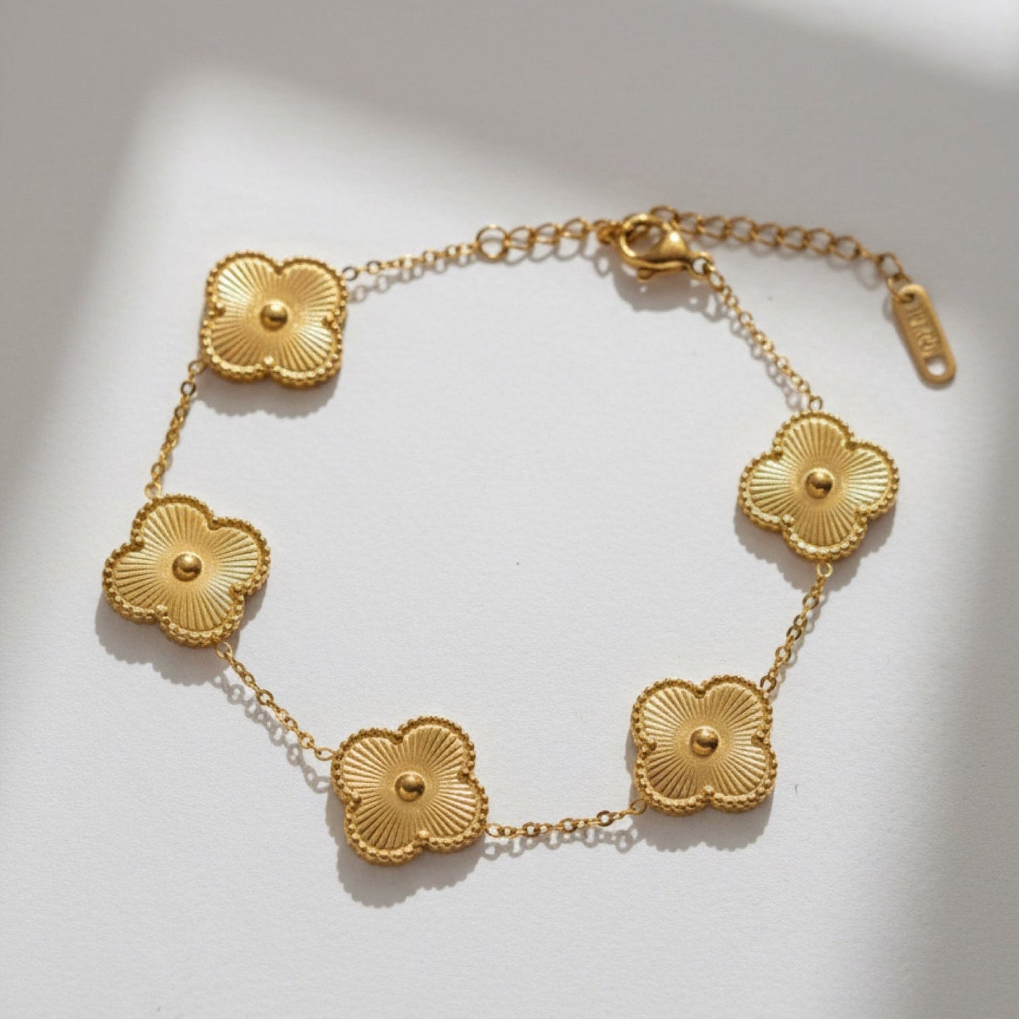 GOLD CLOVER CHARM BRACELET